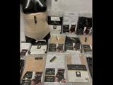 a lot of items on a table with a mannequin