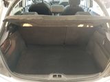 a trunk of a car with the back door open