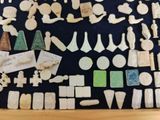 a picture of a collection of carved objects on a table
