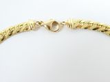 an image of a gold bracelet with a clasp on a white background