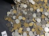 a lot of coins that are sitting on a table