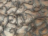 a close up view of a wood carving of a tree