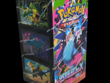 a box of pokemon trading cards on a black background