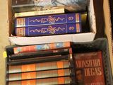 a box full of books sitting on the floor