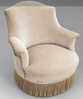 Fauteuil crapaud garni de velours