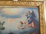 a picture of a painting of an angel and a child