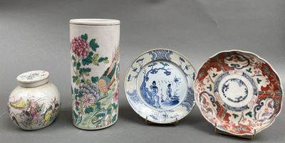 four different types of vases and plates are displayed on a table
