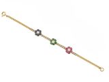 a gold bracelet with multi colored stones on a chain