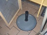 a black object in the middle of the floor