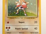 a close up of a pokemon card on a white surface