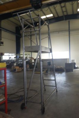 a picture of a large industrial building with a ladder
