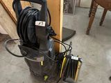 an image of a power washer sitting on the floor