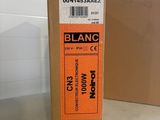an orange box with a black and white label sitting on top of a table