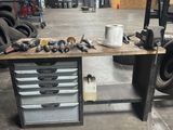 an image of a workbench in a garage with tools