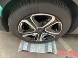 a close up of a tire on a car ' s rim