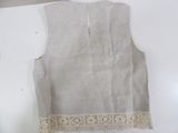 an image of a piece of linen with lace on it