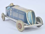 a blue toy car that is sitting on a white surface