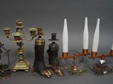 many different types of candles that are on the table
