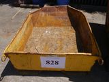a yellow dump truck with a number on the side