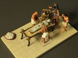 a miniature model of a man being taken to a hospital