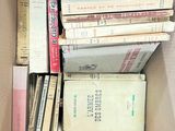 a box full of books sitting on top of a table
