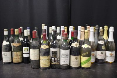 a lot of bottles of wine on the table