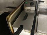 an image of a commercial fryer in a commercial kitchen