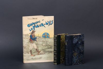 two books sitting next to each other on a table