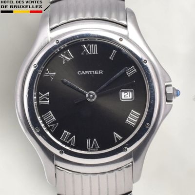an image of a close up of a wrist watch with roman numerals