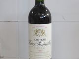 a bottle of wine that is sitting on a table