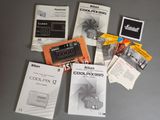 a lot of manuals that are on the table