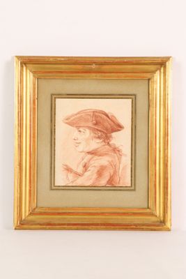 portrait of a woman in a straw hat, in a gold frame