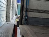 a truck that is parked on the side of the street