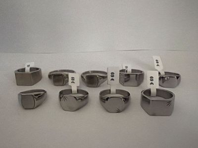 a lot of rings that are sitting on a table