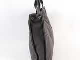 the back of a black leather bag with a zipper on it