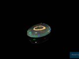 an image of a clock that is lit up in the dark