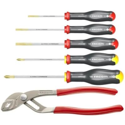 six different types of screwdrivers and pliers in a row