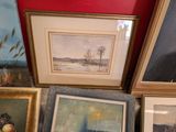 three framed pictures of a man and a woman on the wall