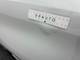 a close up of a sticker on a car ' s trunk