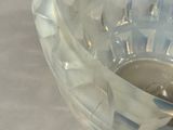 a close up of a clear glass bowl with water in it