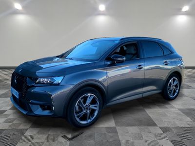 a grey 2020 dsx is parked on a checkered floor