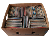 a cardboard box filled with a lot of records