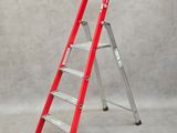 a red ladder against a grey background