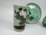 two vases that are sitting next to each other on a table