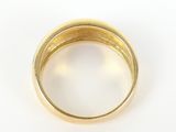 an image of a close up of a gold ring on a white surface