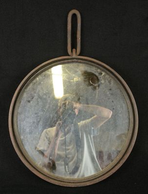 a man taking a picture of himself in a mirror