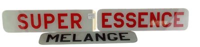 two street signs that say super essence and melange