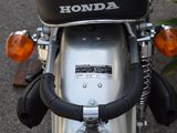 a close up of a motorcycle parked on the street