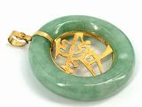 a picture of a green jade pendant with a gold plated design