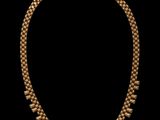 un collier en or sur fond noir